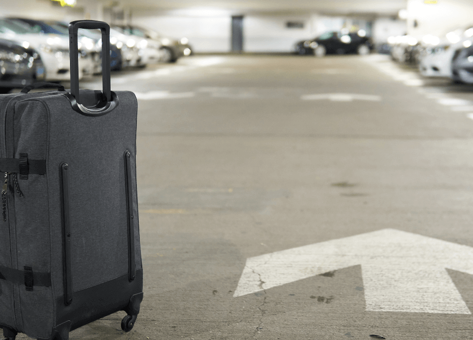 suitcase in an airport car park